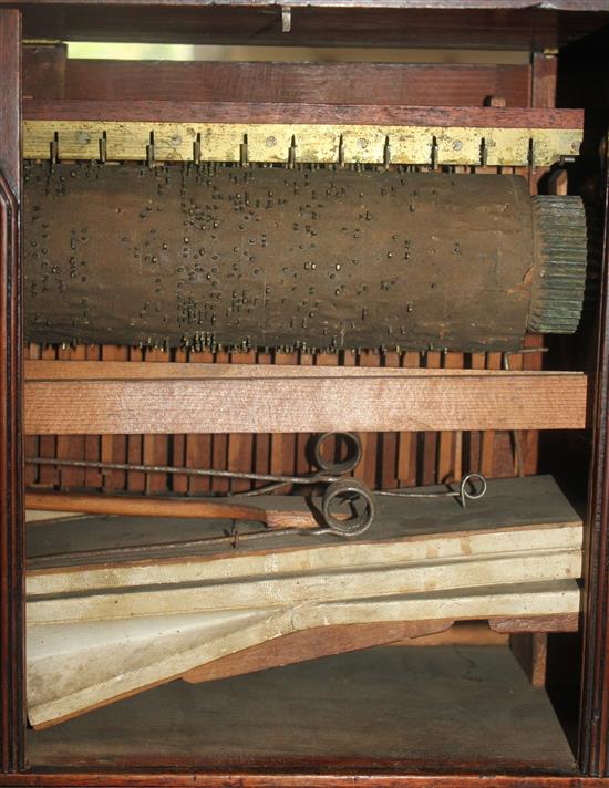 An early 19th century mahogany barrel organ, 12.5in.